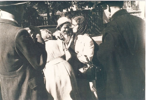 The  moment of departure from the orphanage. The Head Mother Aniela Szoździńska with Gitta in her arms.